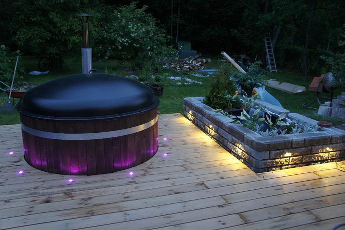 LED Plinth Lights installed in decking around hot tub and walled garden